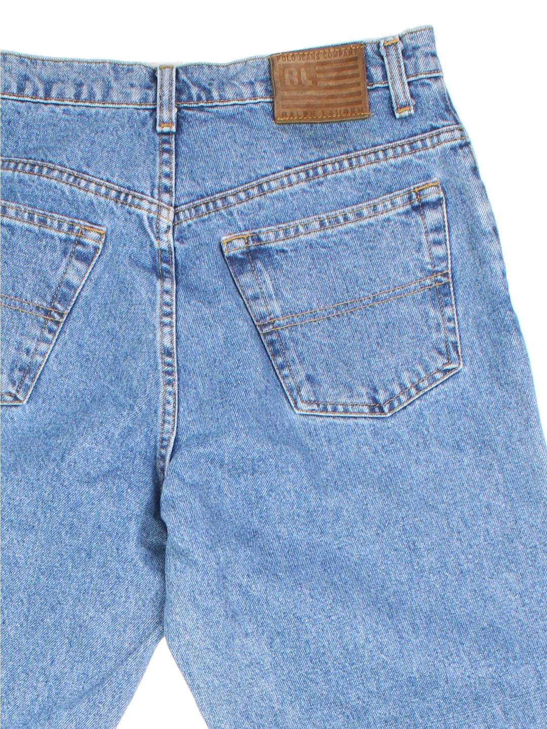 Ralph Lauren jeans in blue colourway. High waisted fit with zip up fly, straight leg and leather logo patch on the back.