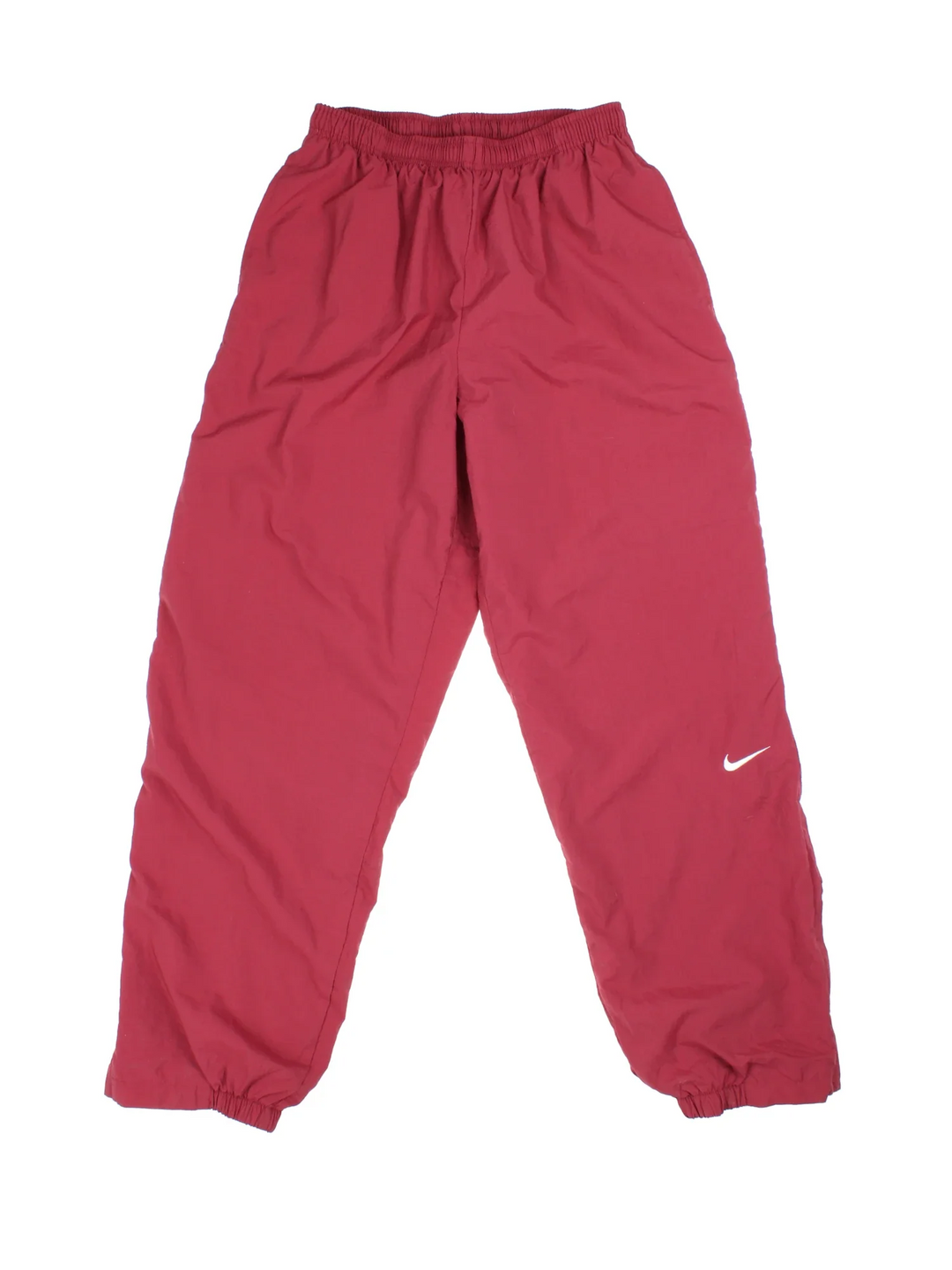 Nike Tracksuit Bottomss in red colourway with two standard side pockets and zip up leg classic Nike Swoosh on the front.