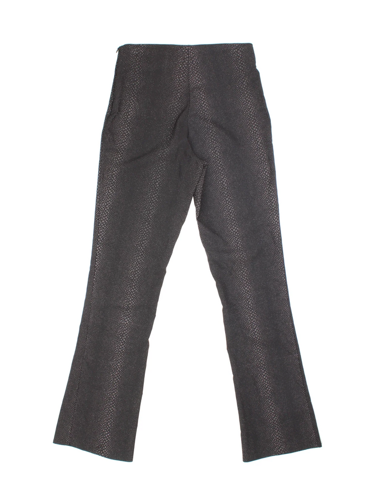 Y2K Snake Print Glitter Pants in black colourway with glittery snake skin patterning and a slight flare to the leg.