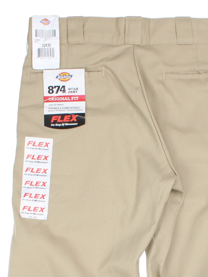 Dickies 874 Work Trousers in tan colourway with multiple pockets and the logo embroidered on the back.
