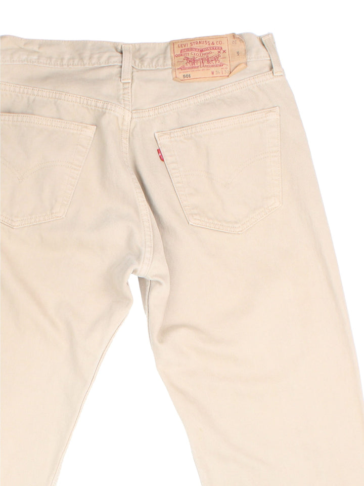 Levi Strauss 501 Jeans in tan colourway. Button fly fastening with side/back pockets and leather patch branding.