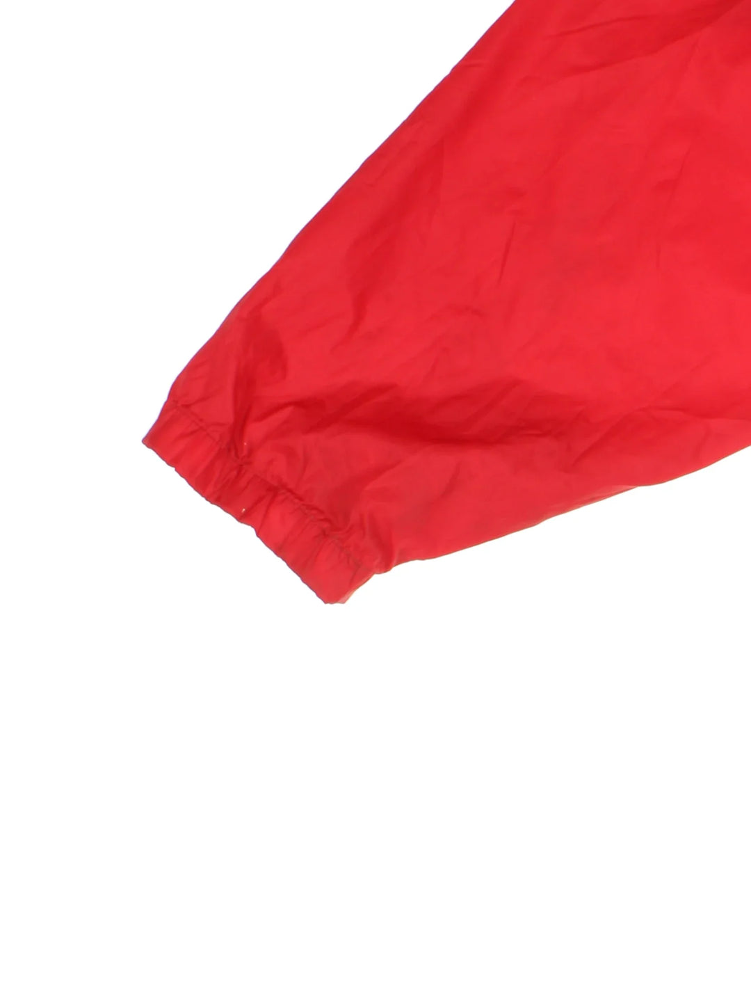Vintage Red Stripe Jamaican Beer Windbreaker Anorak Jacket in a red colourway. Half zip and button up closure, has multiple pockets, hooded, and has the spell out logo embroidered on the front.