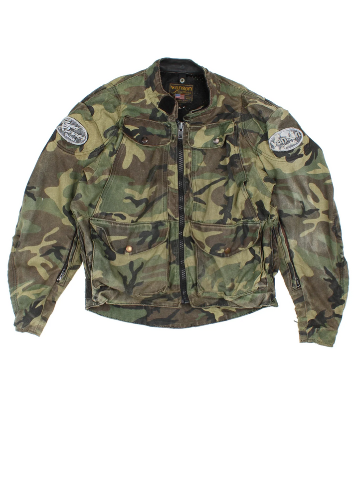 Vintage Vanson Quad Runner Camo Motorcycle Jacket in a green colourway. Zips up and has multiple pockets, and the logos embroidered on the sleeves and back.