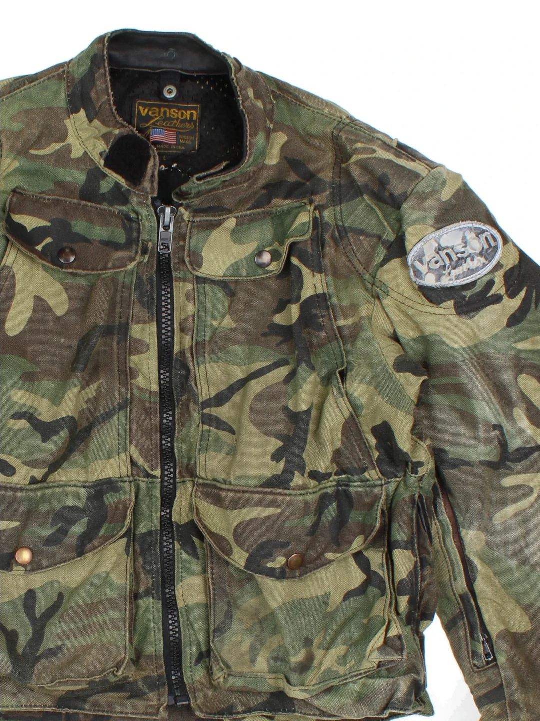 Vintage Vanson Quad Runner Camo Motorcycle Jacket in a green colourway. Zips up and has multiple pockets, and the logos embroidered on the sleeves and back.
