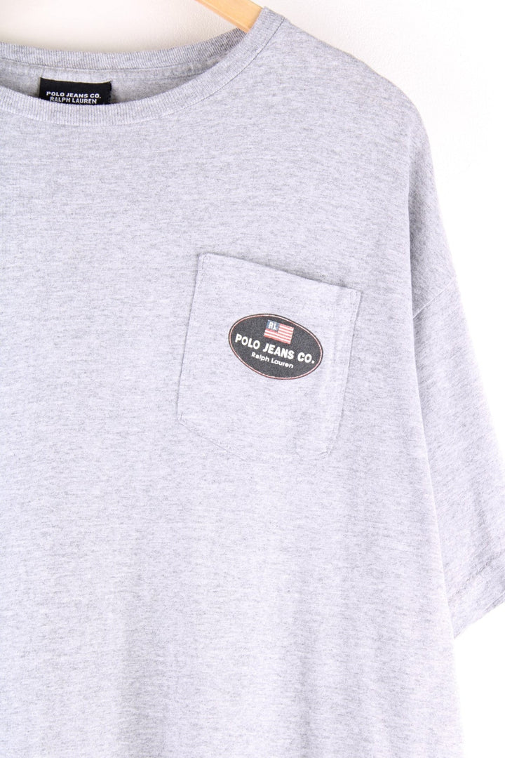 90's Ralph Lauren Polo Jeans Co. t-shirt in grey with a chest pocket and the logo printed on the front.