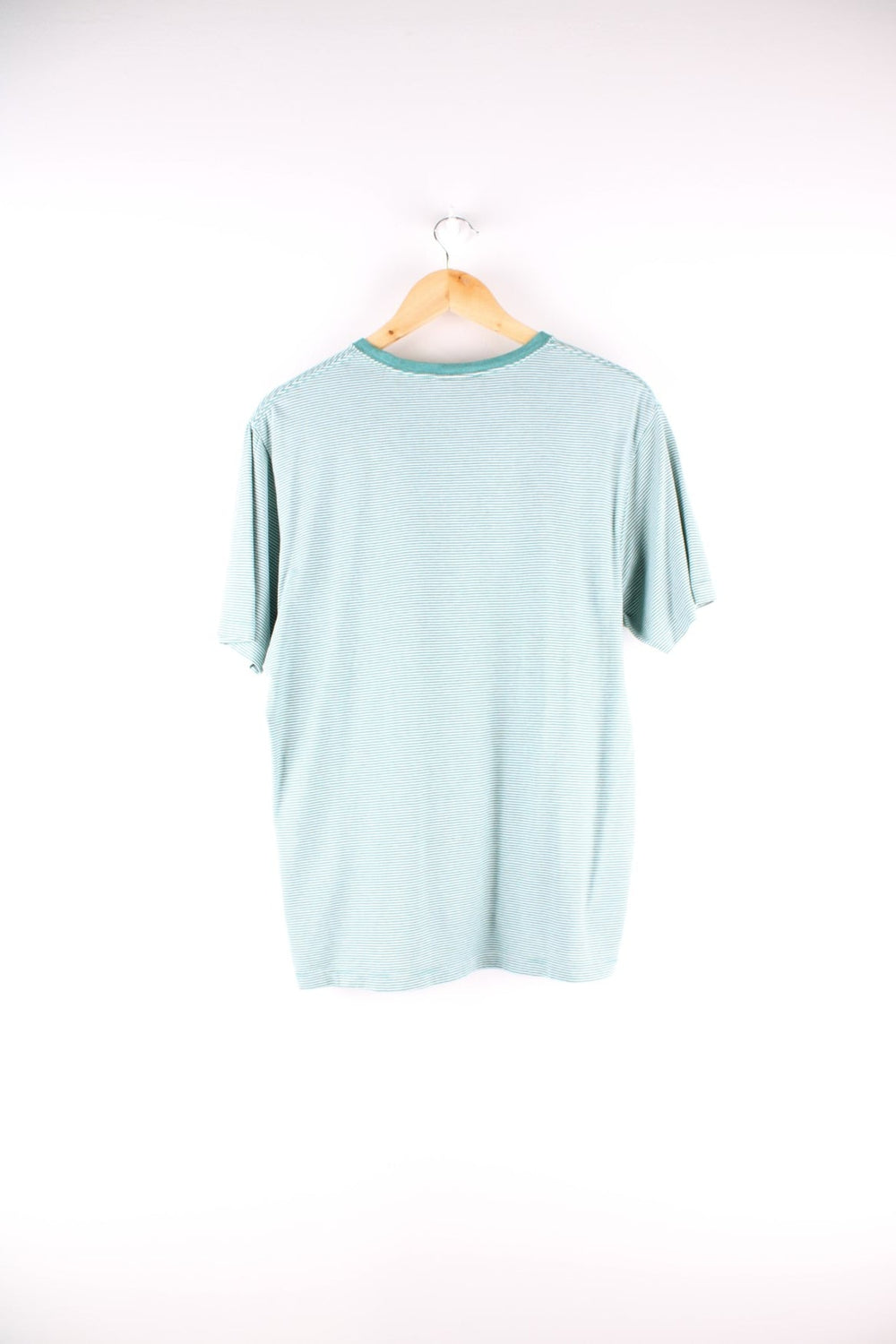 Patagonia organic cotton stiped t-shirt in green and white with one breast pocket and a small logo tab on the lower left side.