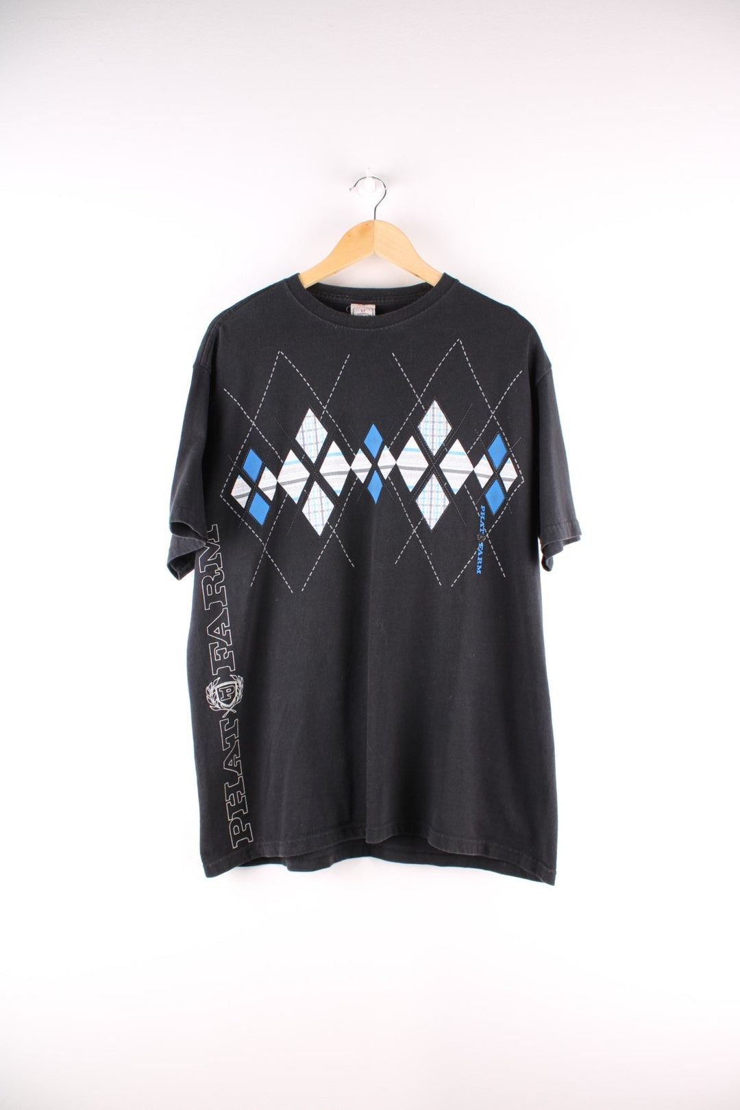 Vintage Phat Farm t-shirt in black with a blue and white argyle print, and a logo up the right side.