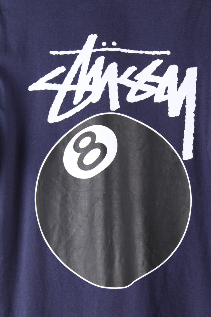 Stussy 8 Ball t-shirt in navy blue with printed logo and 8 ball graphic on the front and back.