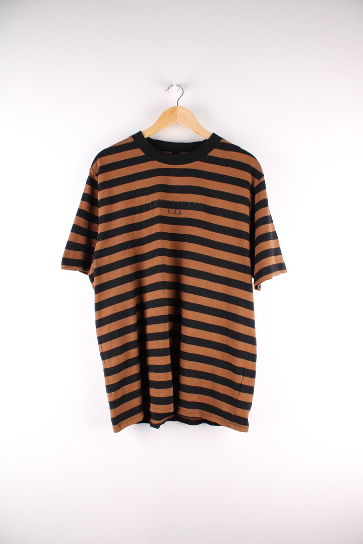 Vintage 90's Guess t-shirt in a brown and black striped colourway with the spell out logo embroidered on the front.
