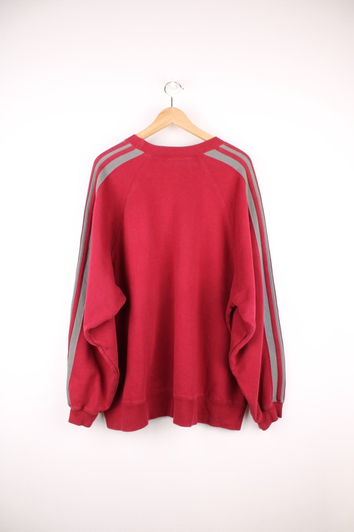 the brand with the three stripes sweatshirt