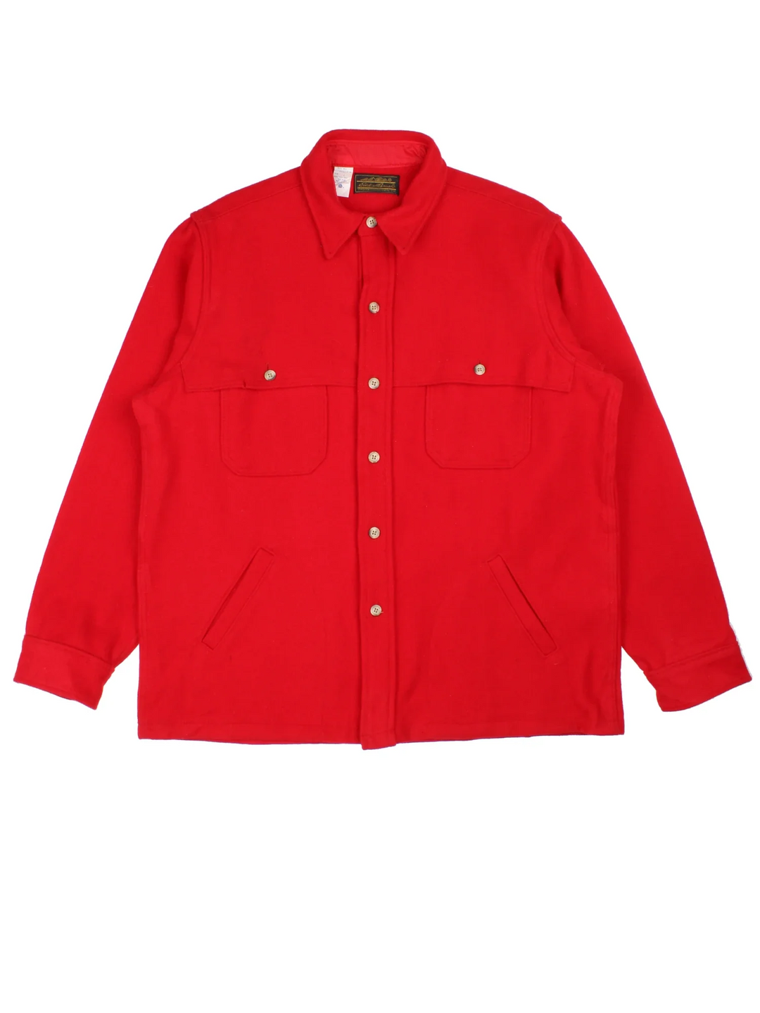 Vintage Eddie Bauer Woollen CPO Over Coat in a red colourway. Buttons up and has multiple pockets.