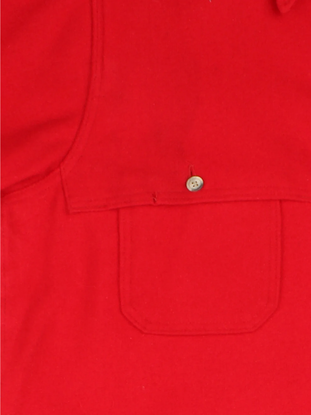 Vintage Eddie Bauer Woollen CPO Over Coat in a red colourway. Buttons up and has multiple pockets.