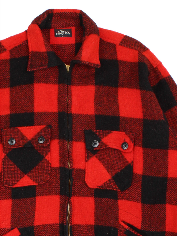 Vintage King Kole Woollen Flannel CPO Coat in a red and black colourway. Zips up and has multiple pockets, and all over plaid pattern.