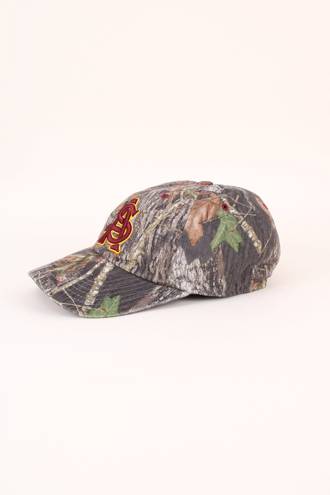 Vintage Arizona State Sun Devils Camo Cap in a green colourway with the logo embroidered on the front, and has adjustable velcro strap at the back.