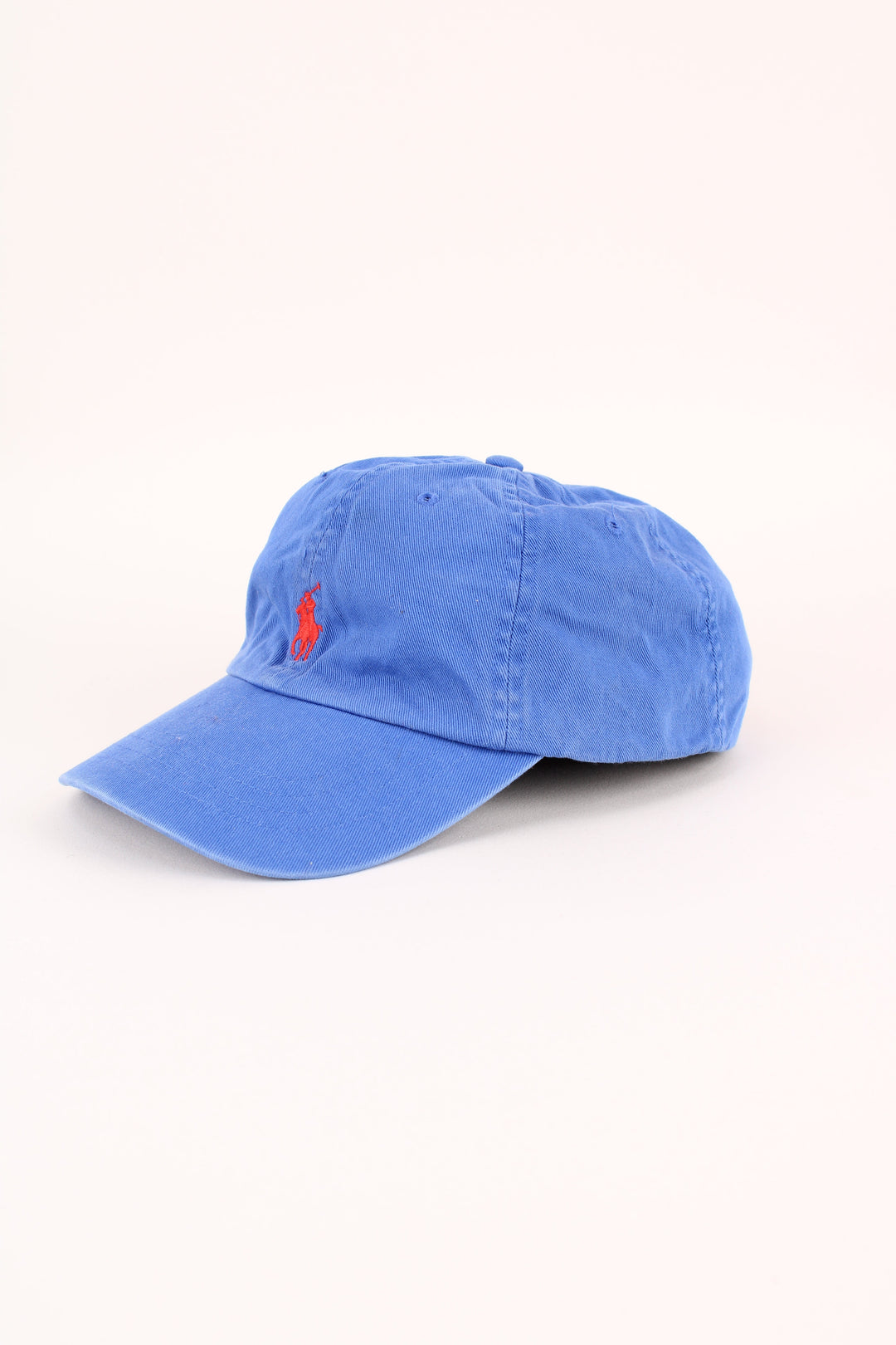 Polo Ralph Lauren Cap in a blue colourway with the logo embroidered on the front/back, and has adjustable strap at the back.