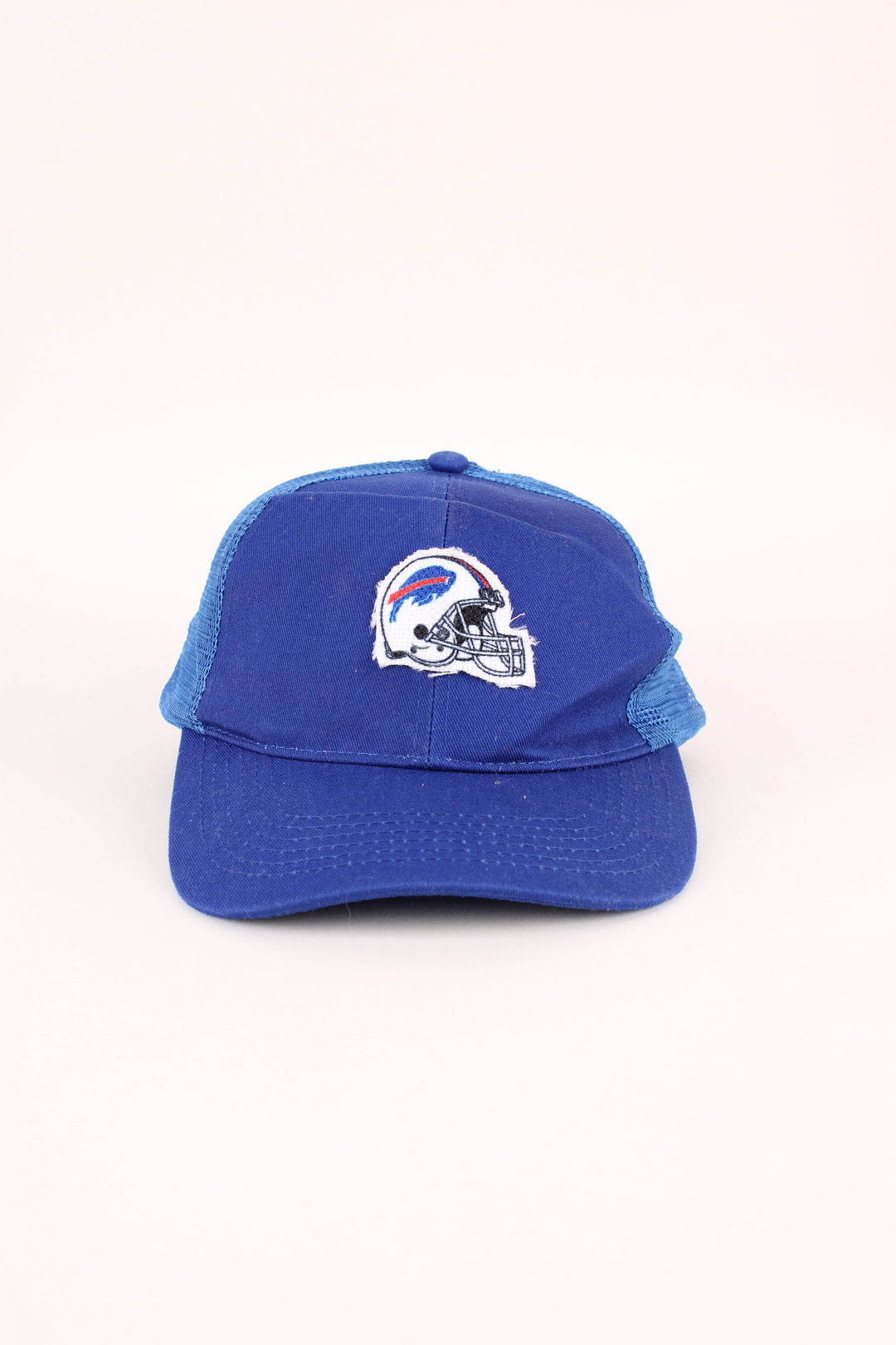 Buffalo Bills NFL Trucker Cap in a blue colourway with the logo embroidered on the front, mesh panelling, and has adjustable strap at the back.