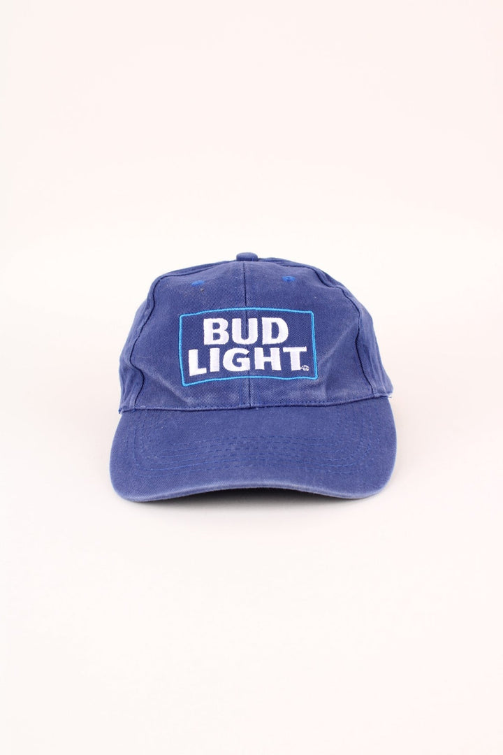 Vintage Bud Light Cap in a blue colourway with the logo embroidered on the front, and has adjustable velcro strap at the back.