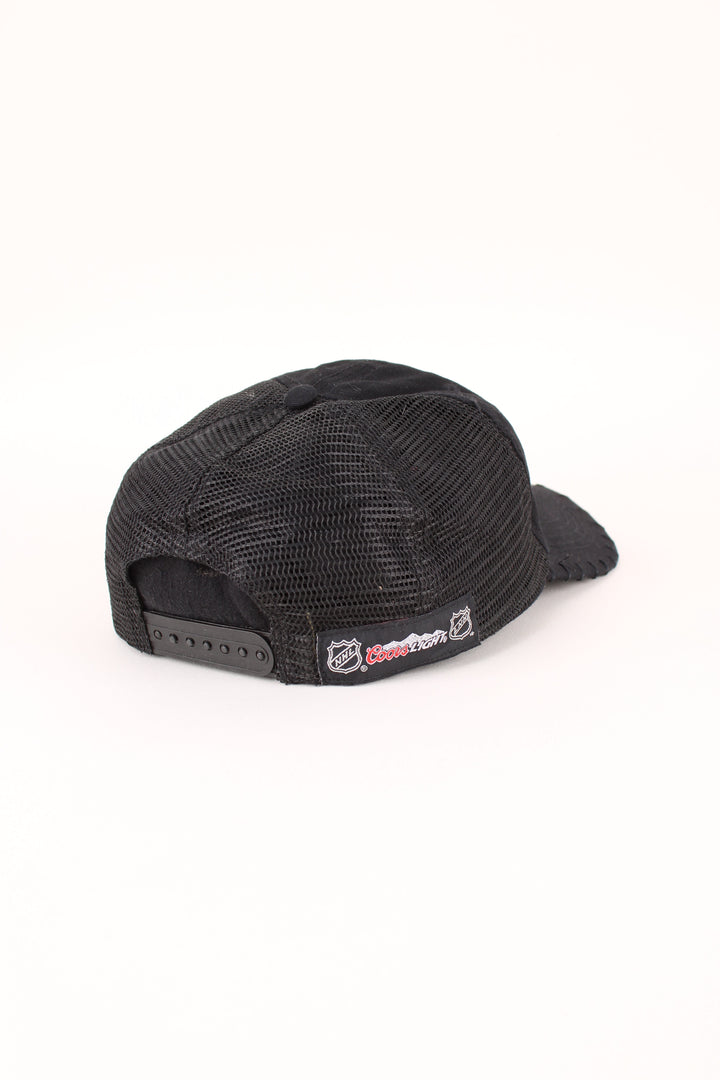 Detroit Red Wings NHL Trucker Cap in a black colourway with the logo embroidered on the front, mesh panelling, and has adjustable snapback.