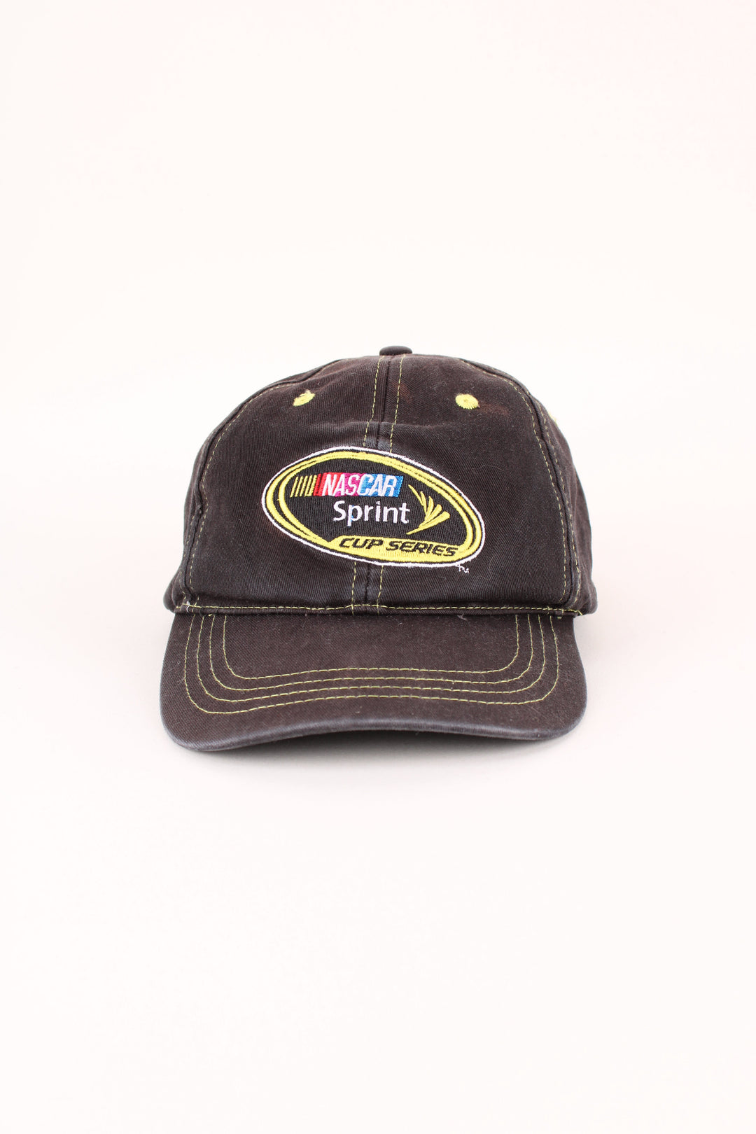 Nascar Racing Cap in a black colourway with the logo embroidered on the front/back, and has adjustable velcro strap at the back.