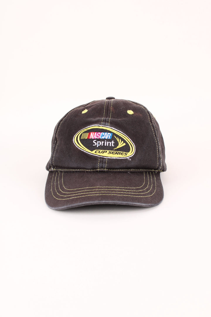Nascar Racing Cap in a black colourway with the logo embroidered on the front/back, and has adjustable velcro strap at the back.