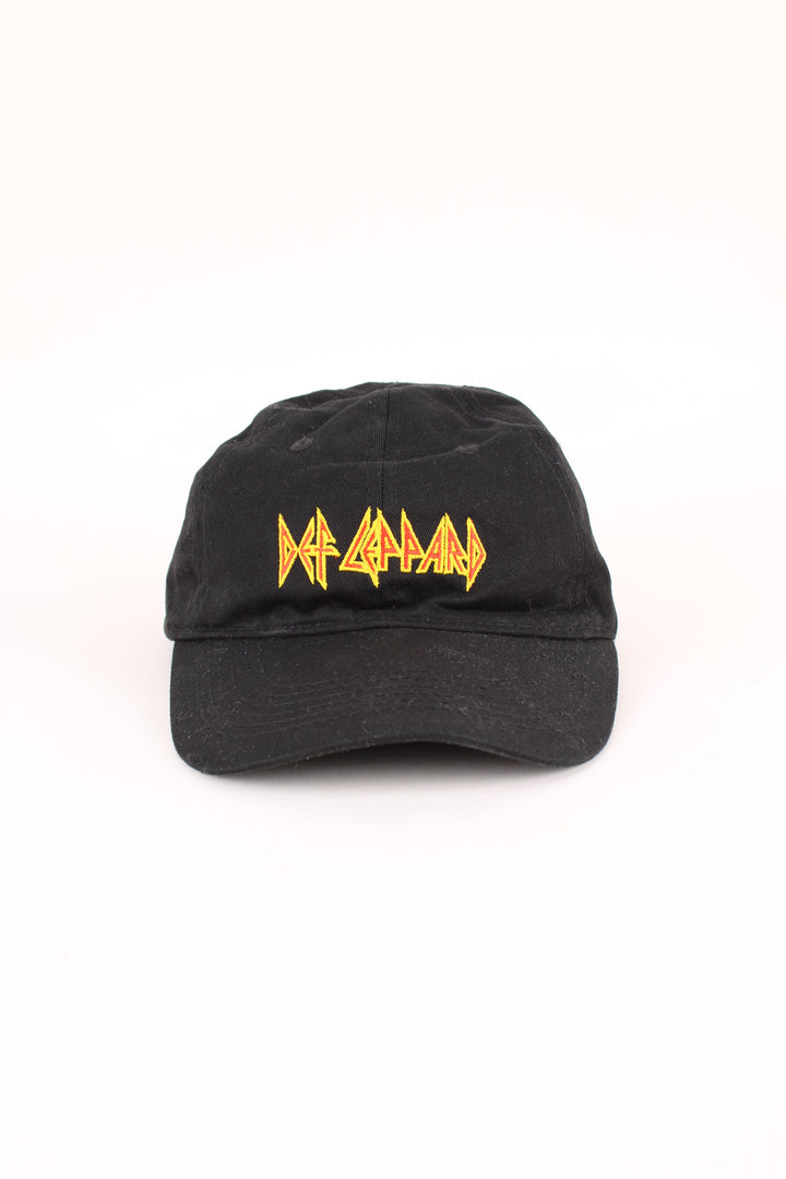 Vintage Def Leppard Cap in a black colourway with the logo embroidered on the front, and has adjustable strap at the back.