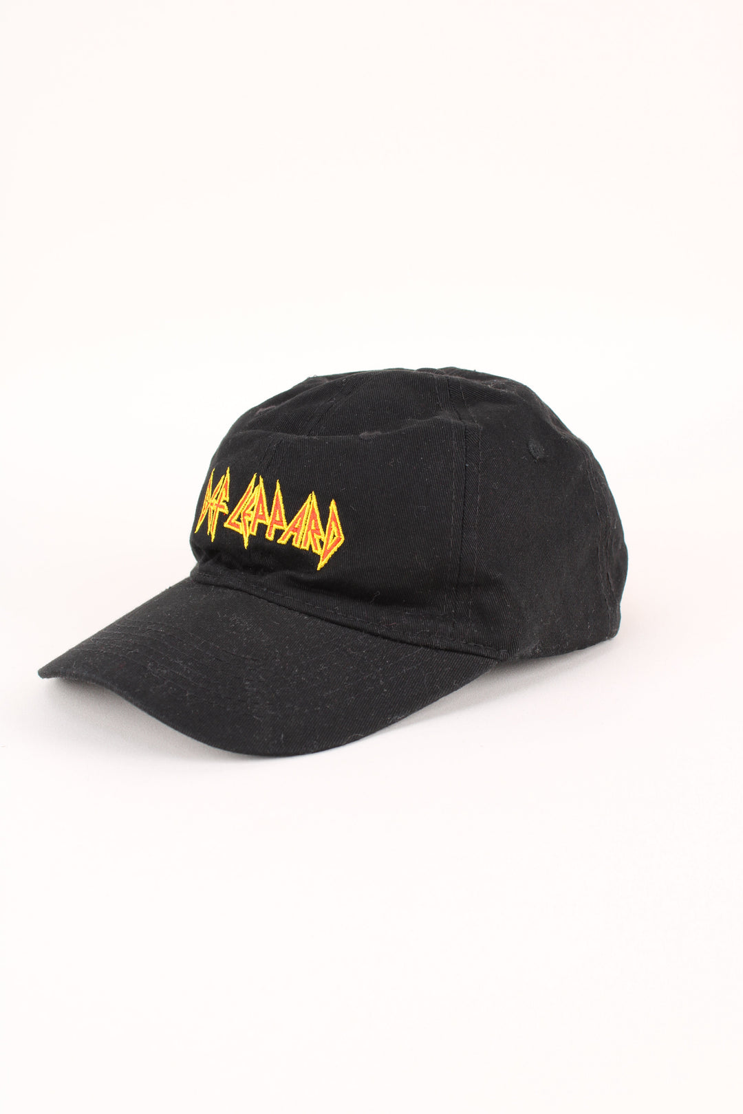 Vintage Def Leppard Cap in a black colourway with the logo embroidered on the front, and has adjustable strap at the back.