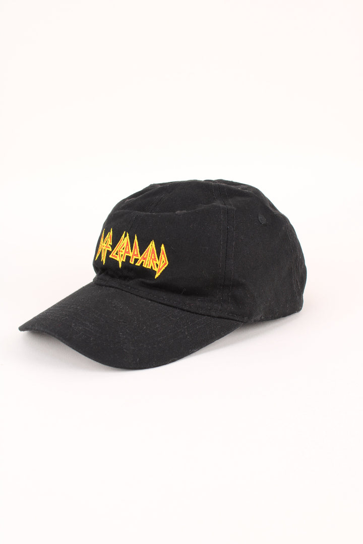 Vintage Def Leppard Cap in a black colourway with the logo embroidered on the front, and has adjustable strap at the back.