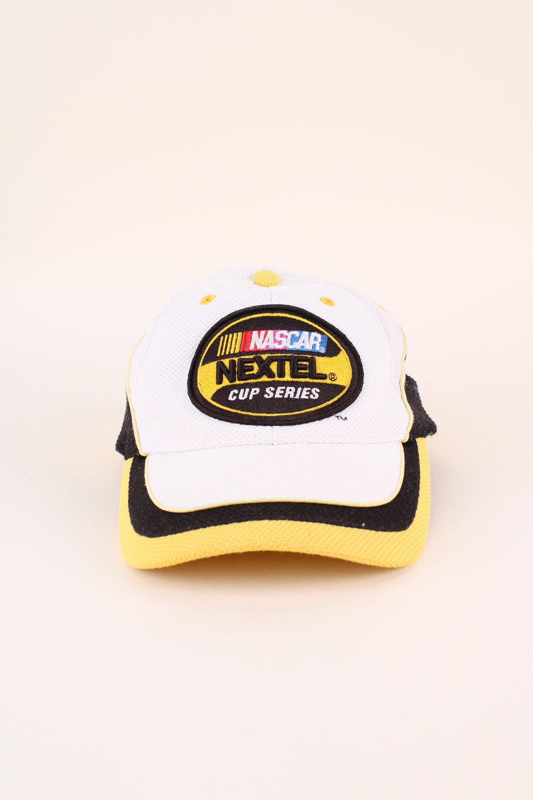 Nascar Racing Cap in a white colourway with the logo embroidered on the front, and has adjustable velcro strap at the back.