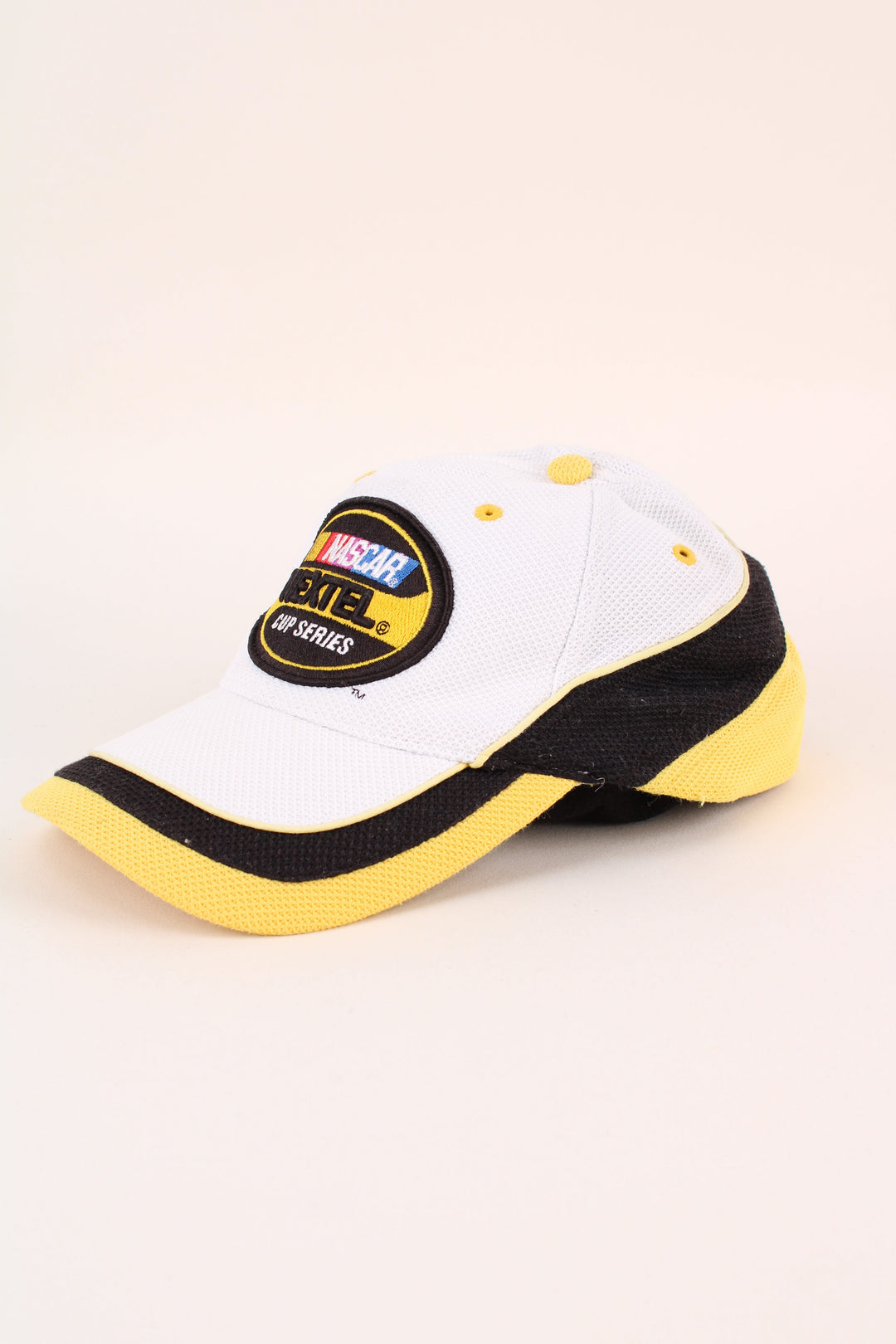 Nascar Racing Cap in a white colourway with the logo embroidered on the front, and has adjustable velcro strap at the back.