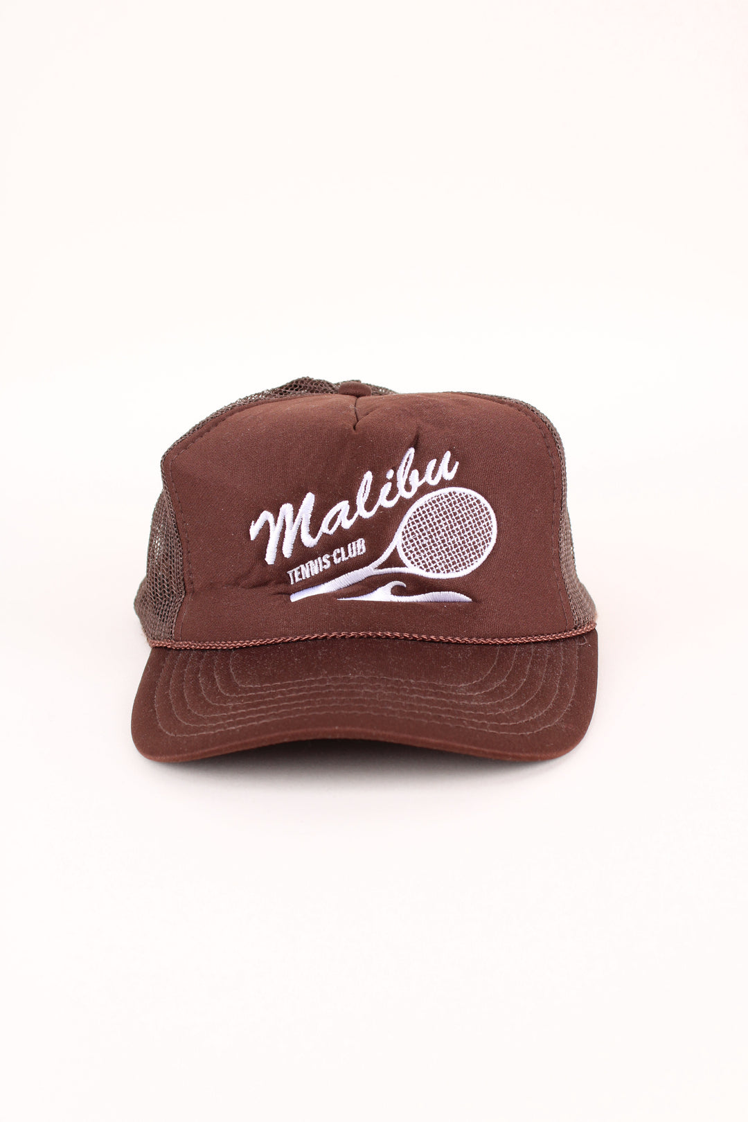 Vintage Malibu Tennis Club Trucker Cap in a brown colourway with the logo embroidered on the front, and has adjustable snapback.
