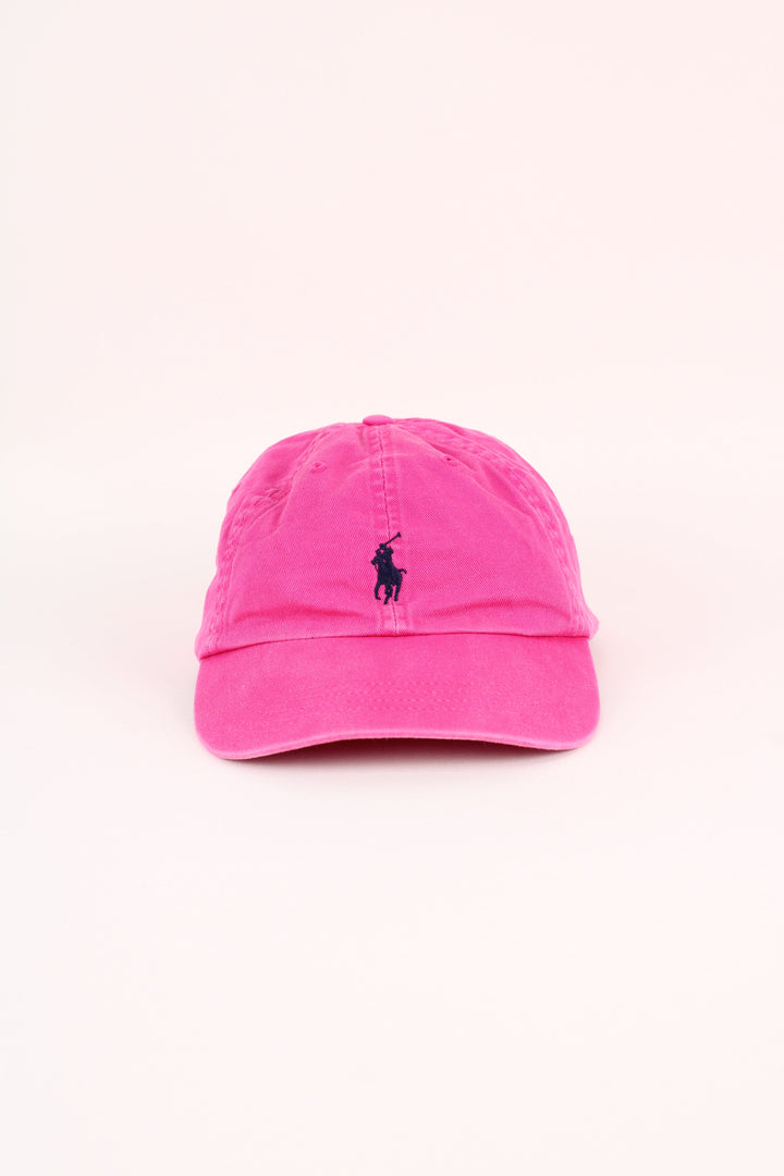 Polo Ralph Lauren Cap in a pink colourway with the logo embroidered on the front/back, and has adjustable leather strap at the back.