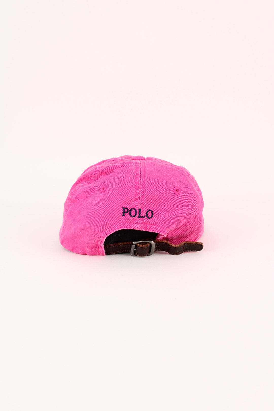 Polo Ralph Lauren Cap in a pink colourway with the logo embroidered on the front/back, and has adjustable leather strap at the back.