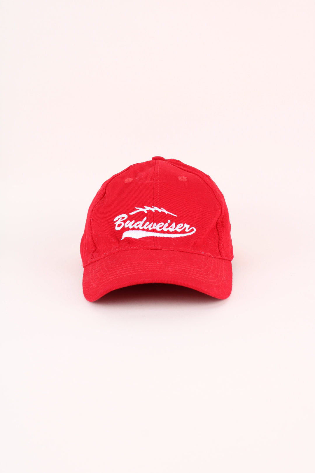 Budweiser NFL Cap in a red colourway with the logo embroidered on the front/back, and has a spandex stretch lining.