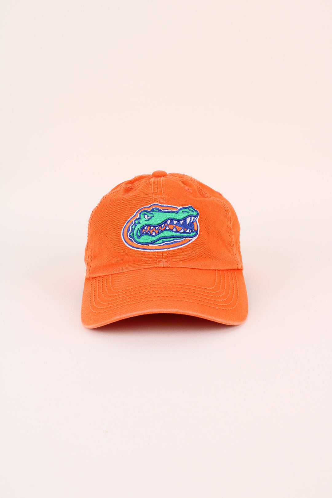Vintage Florida Gators Cap in a orange colourway with the logo embroidered on the front, and has adjustable strap at the back.