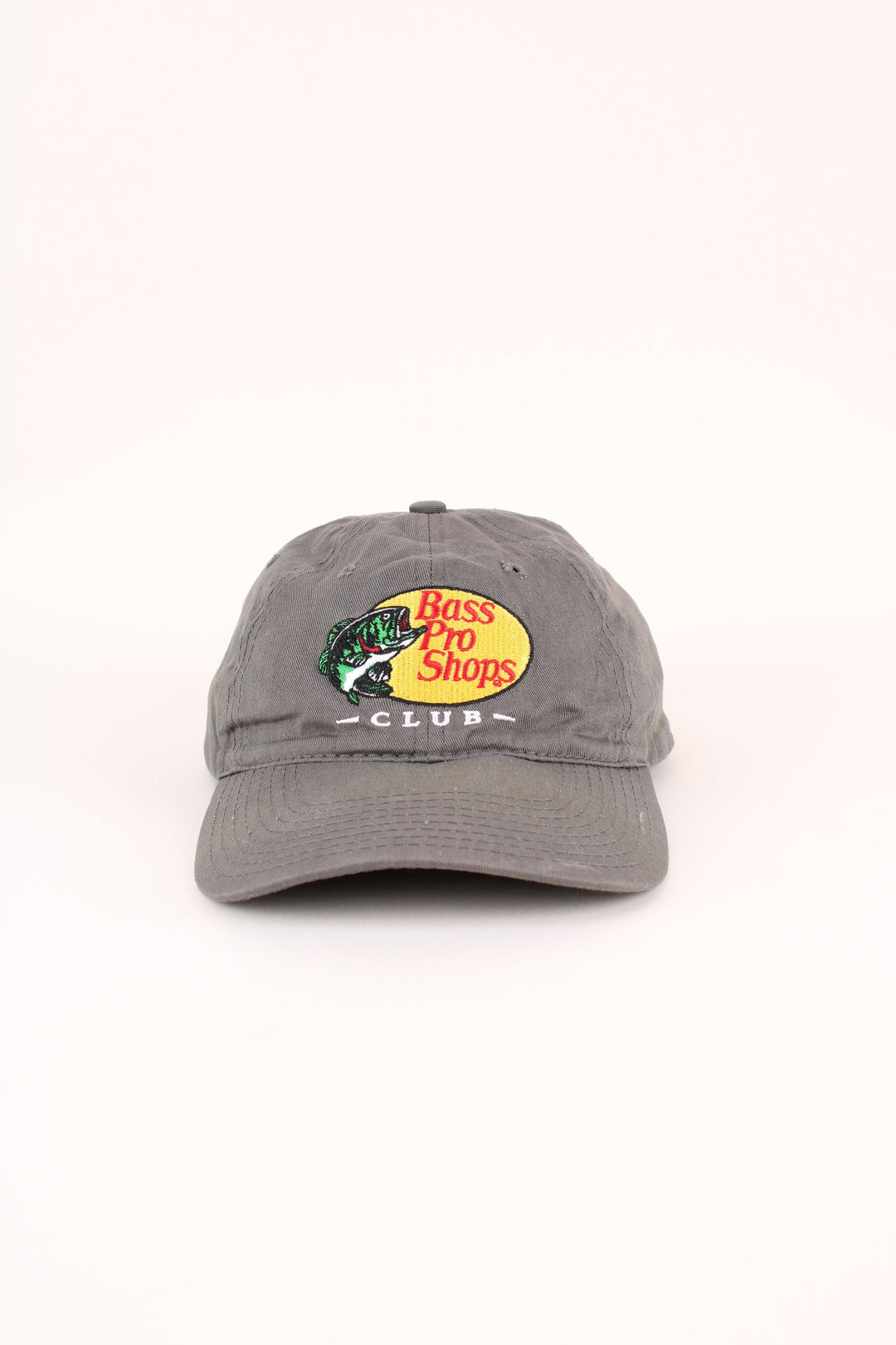Vintage Bass Pro Shops Club Cap in a grey colourway with the logo embroidered on the front, and has adjustable strap on the back.