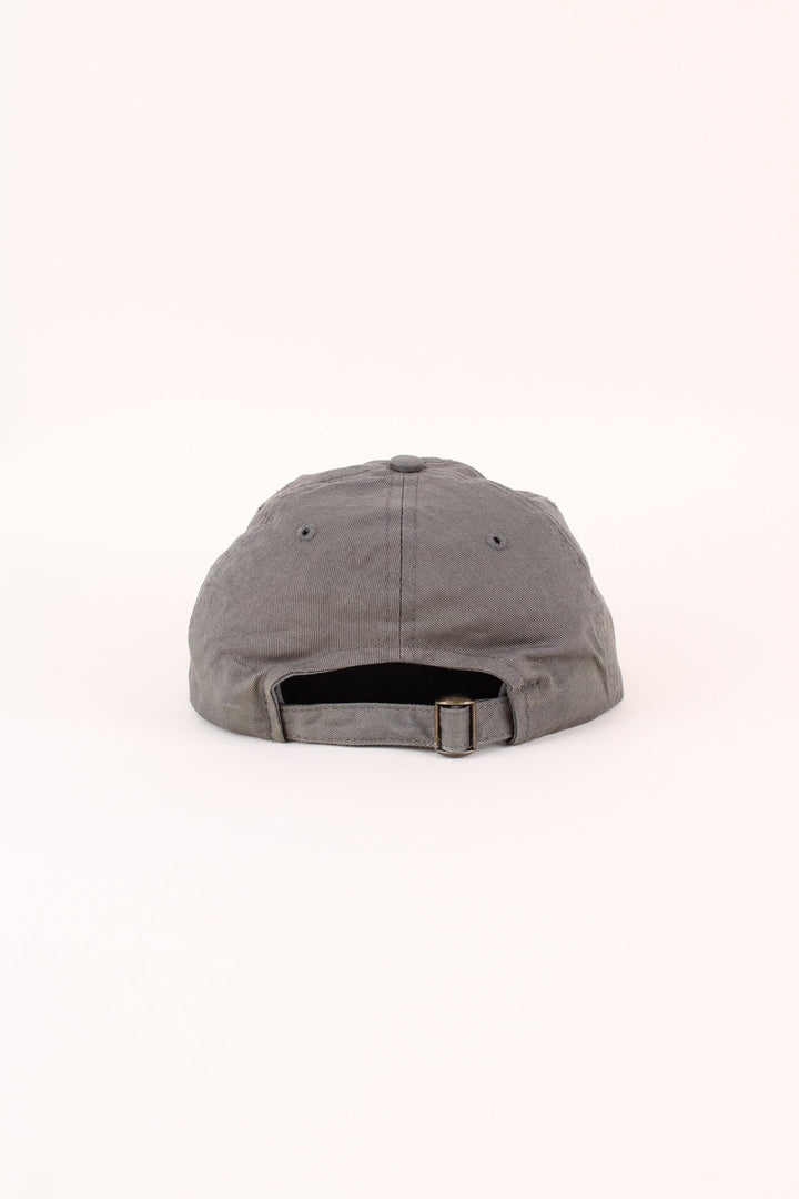 Vintage Bass Pro Shops Club Cap in a grey colourway with the logo embroidered on the front, and has adjustable strap on the back.