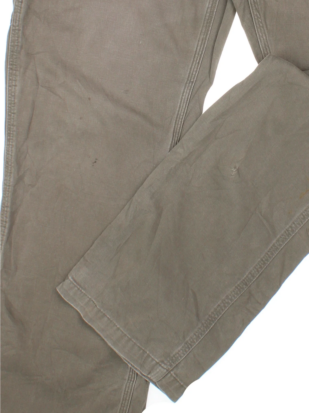 Carhartt Carpenter Trousers in a green colourway with multiple pockets and the logo embroidered on the back.