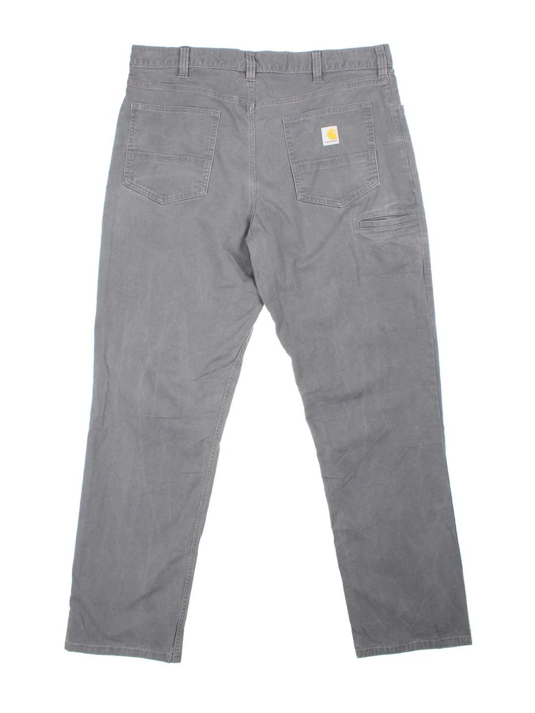 Carhartt Trousers in a grey colourway with multiple pockets and the logo embroidered on the back.