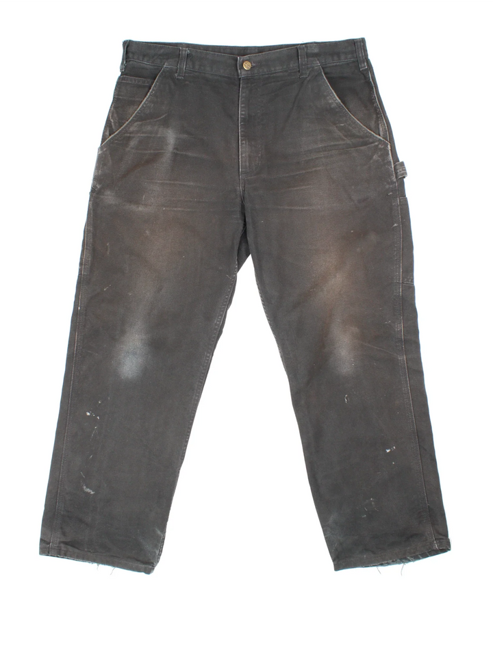 Carhartt Carpenter Jeans in a black colourway with multiple pockets and the logo embroidered on the back.