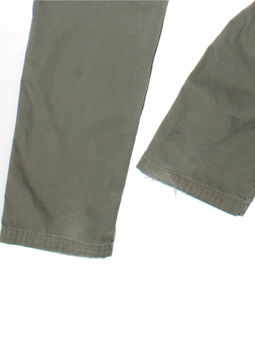 Carhartt Cargo Trousers in a green colourway with multiple pockets and the logo embroidered on the back.