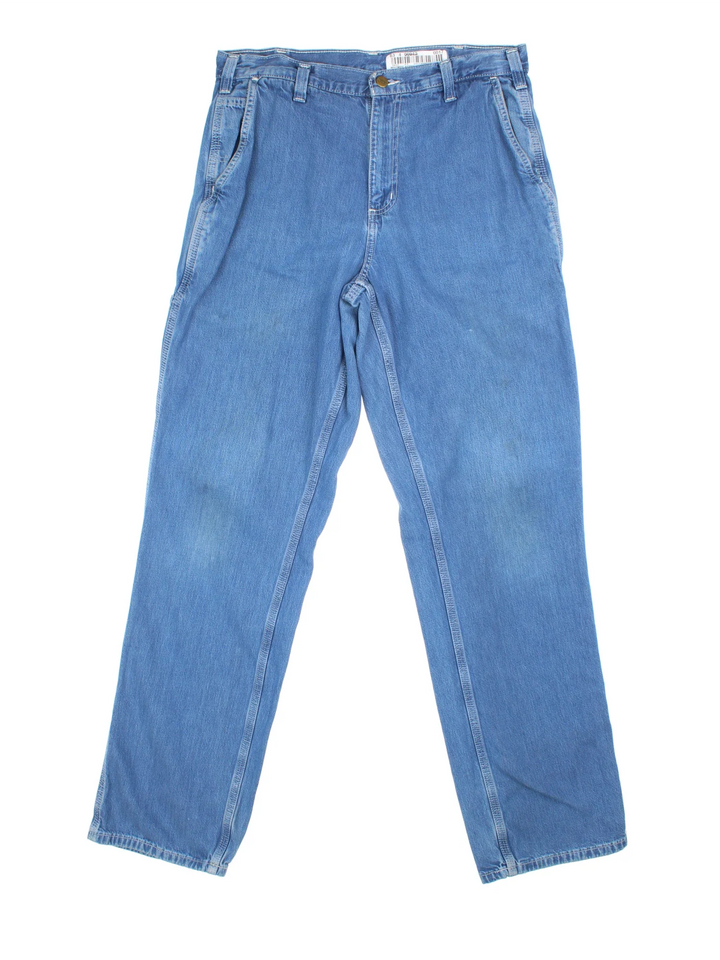 Carhartt Carpenter Jeans in a blue colourway with multiple pockets and the logo embroidered on the back.