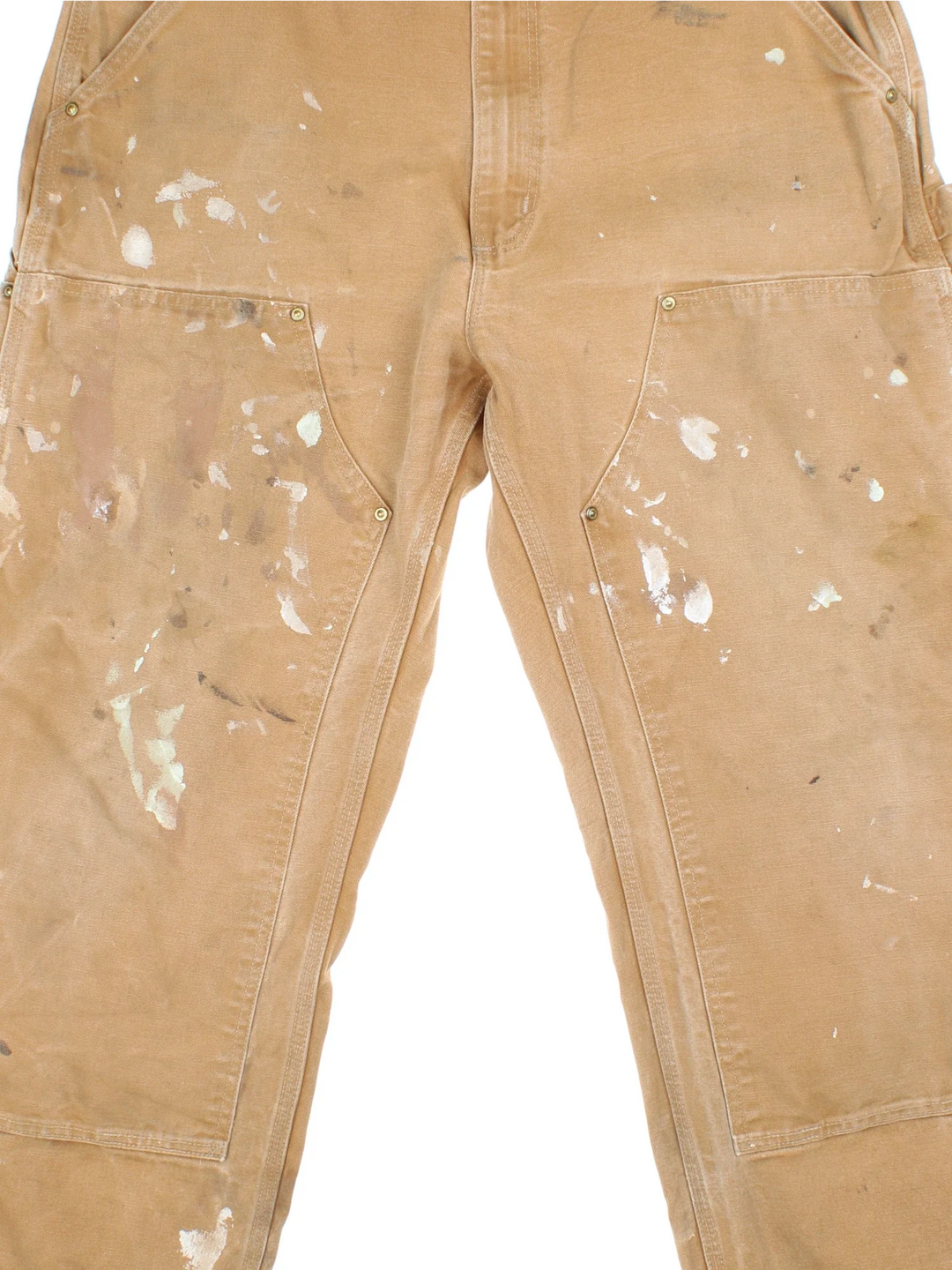 Carhartt Double Knee Jeans in a tan colourway with multiple pockets and the logo embroidered on the back.