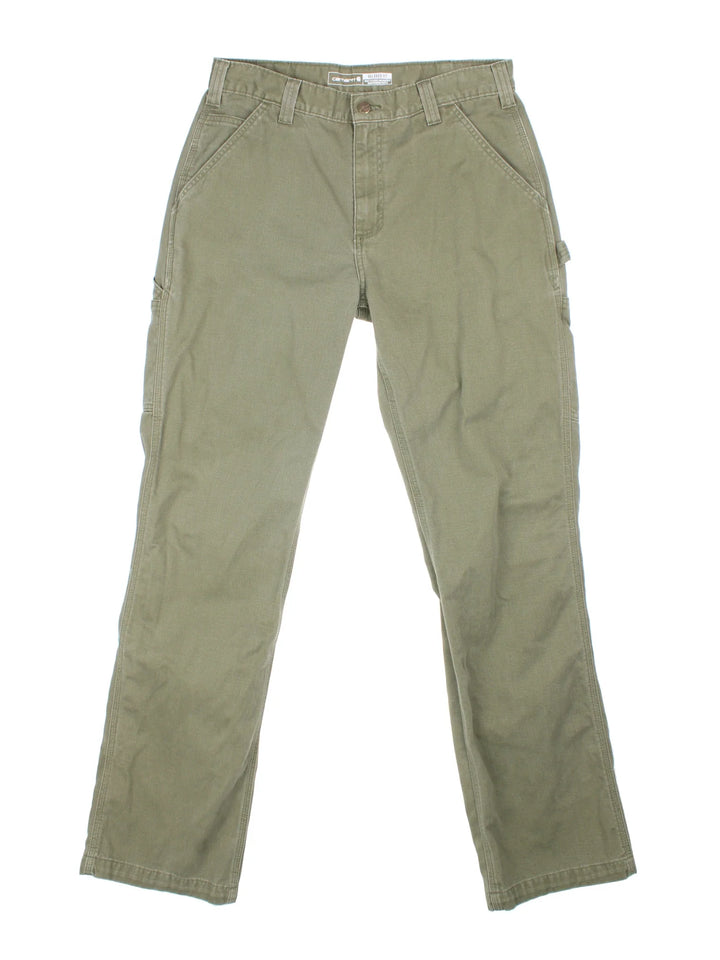 Carhartt Carpenter Trousers in a green colourway with multiple pockets and the logo embroidered on the back.