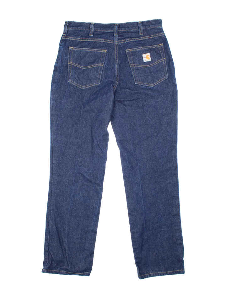 Carhartt Jeans in a blue colourway with multiple pockets and the logo embroidered on the back.