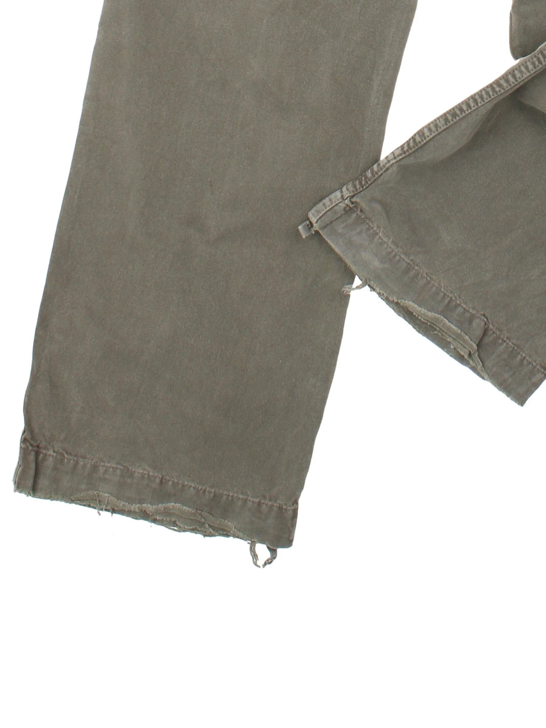 Carhartt Cargo Trousers in a green colourway with multiple pockets and the logo embroidered on the back.