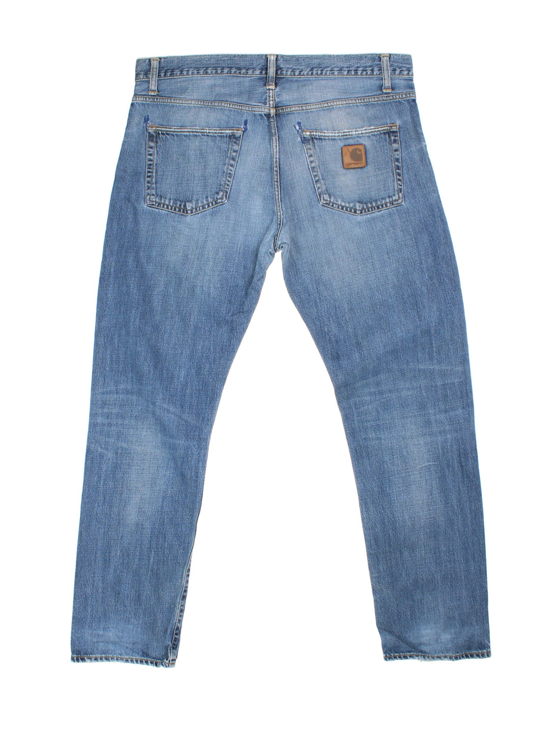 Carhartt Jeans in a blue colourway with multiple pockets and the logo embroidered on the back.