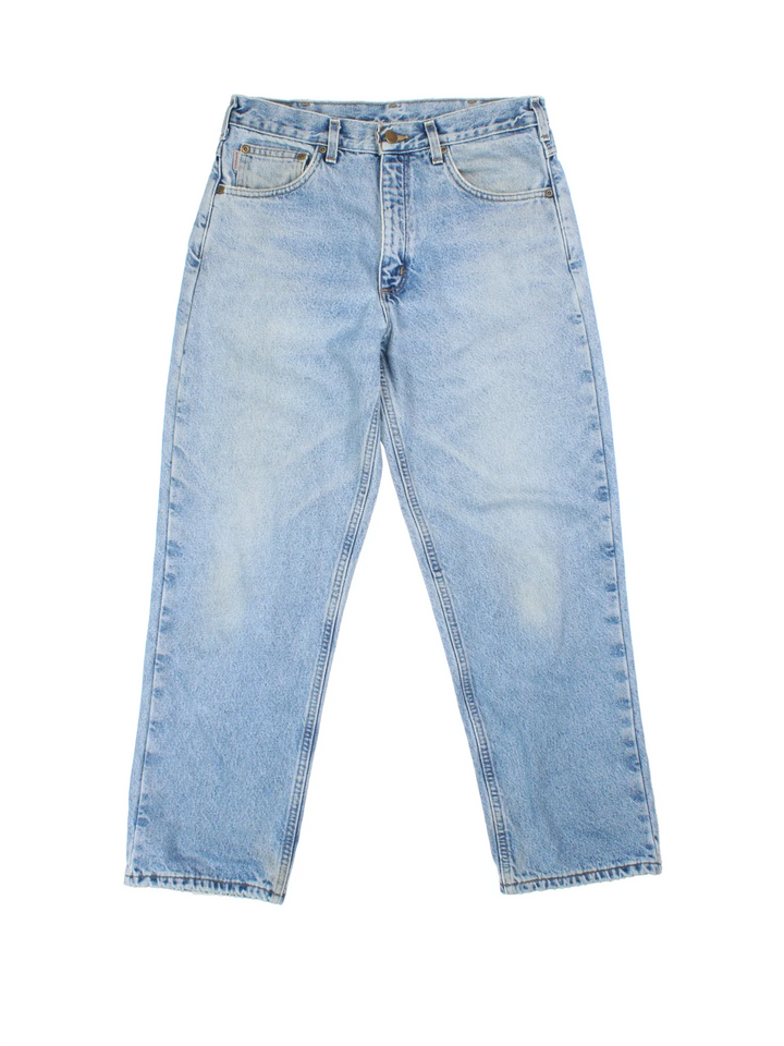 Carhartt Jeans in a blue colourway with multiple pockets, plaid pattern lining, and the logo embroidered on the back.