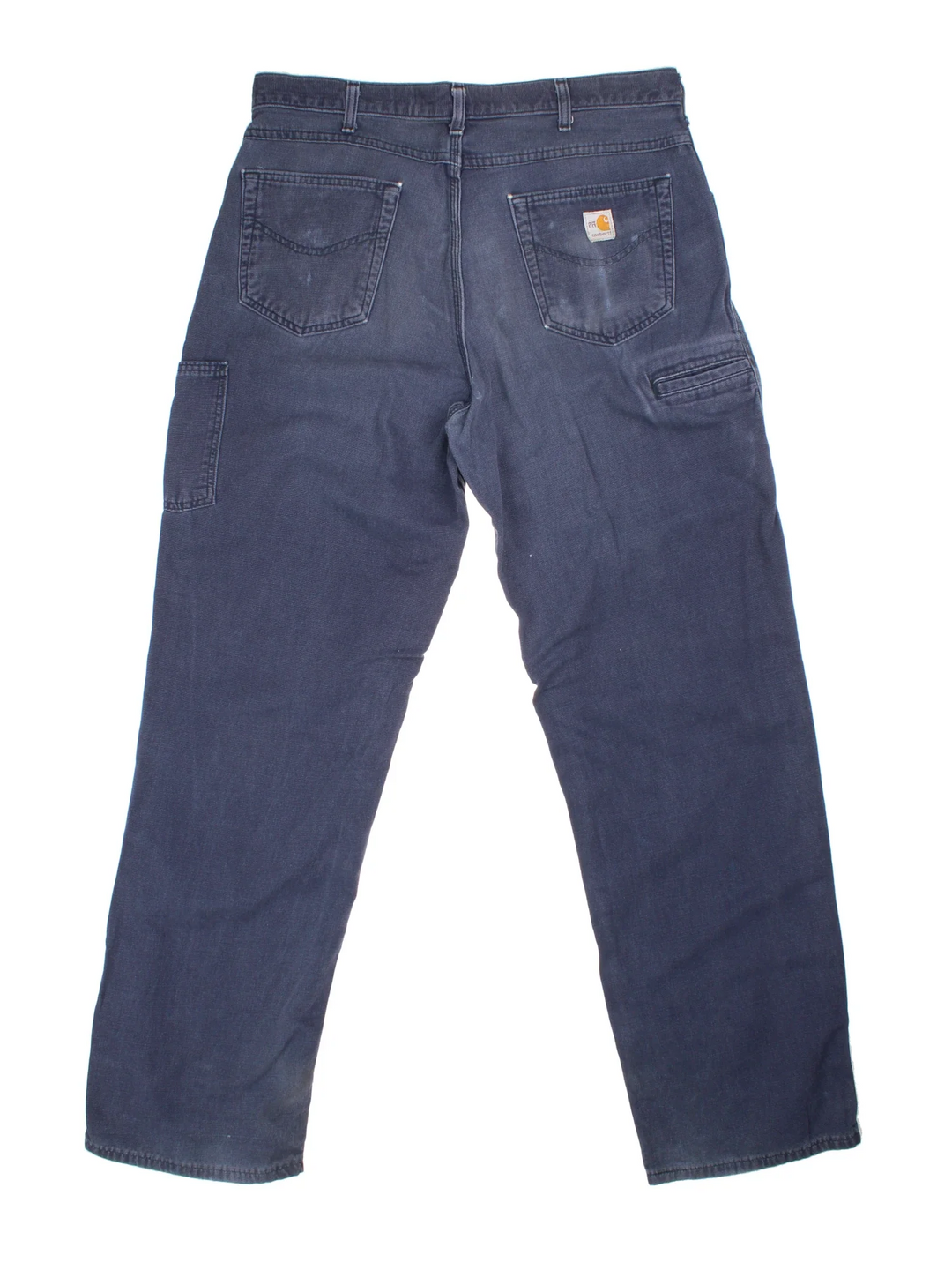 Carhartt Carpenter Trousers in a blue colourway with multiple pockets and the logo embroidered on the back.