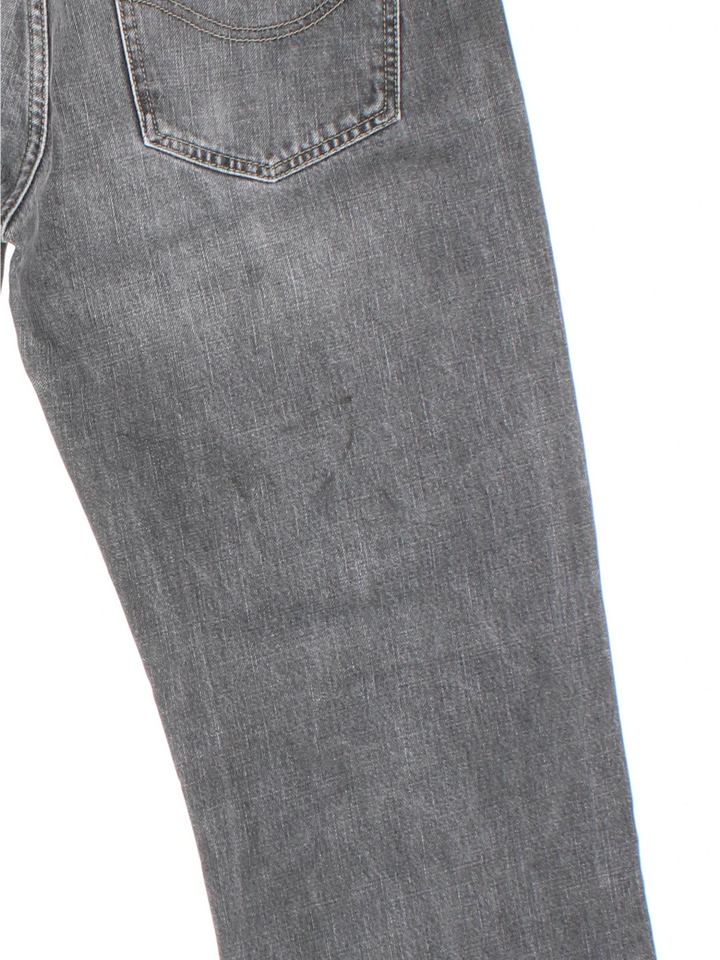 Carhartt Jeans in a grey colourway with multiple pockets and the logo embroidered on the back.