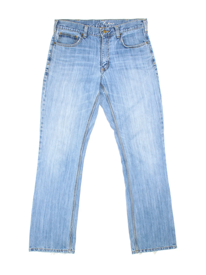 Carhartt Jeans in a blue colourway with multiple pockets and the logo embroidered on the back.